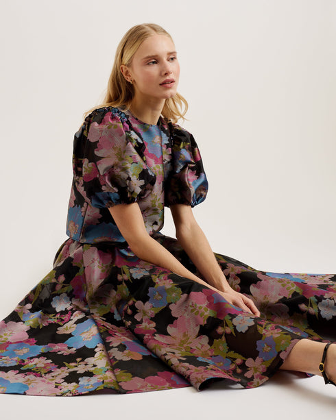 BURSA-Skirts-A bold jacquard floral design makes BURSA the ultimate statement skirt. Fitted at the waist and flaring out in an A-line silhouette, this midi skirt will bring fun and flounce to your looks every season. Keep it simple for spring with a plain t-shirt, or edge it up for winter with leather accessories. Midi skirt Jacquard floral design A-line silhouette Swing style Fitted waist Front pockets Hidden zip fastening- Ted Baker Romania